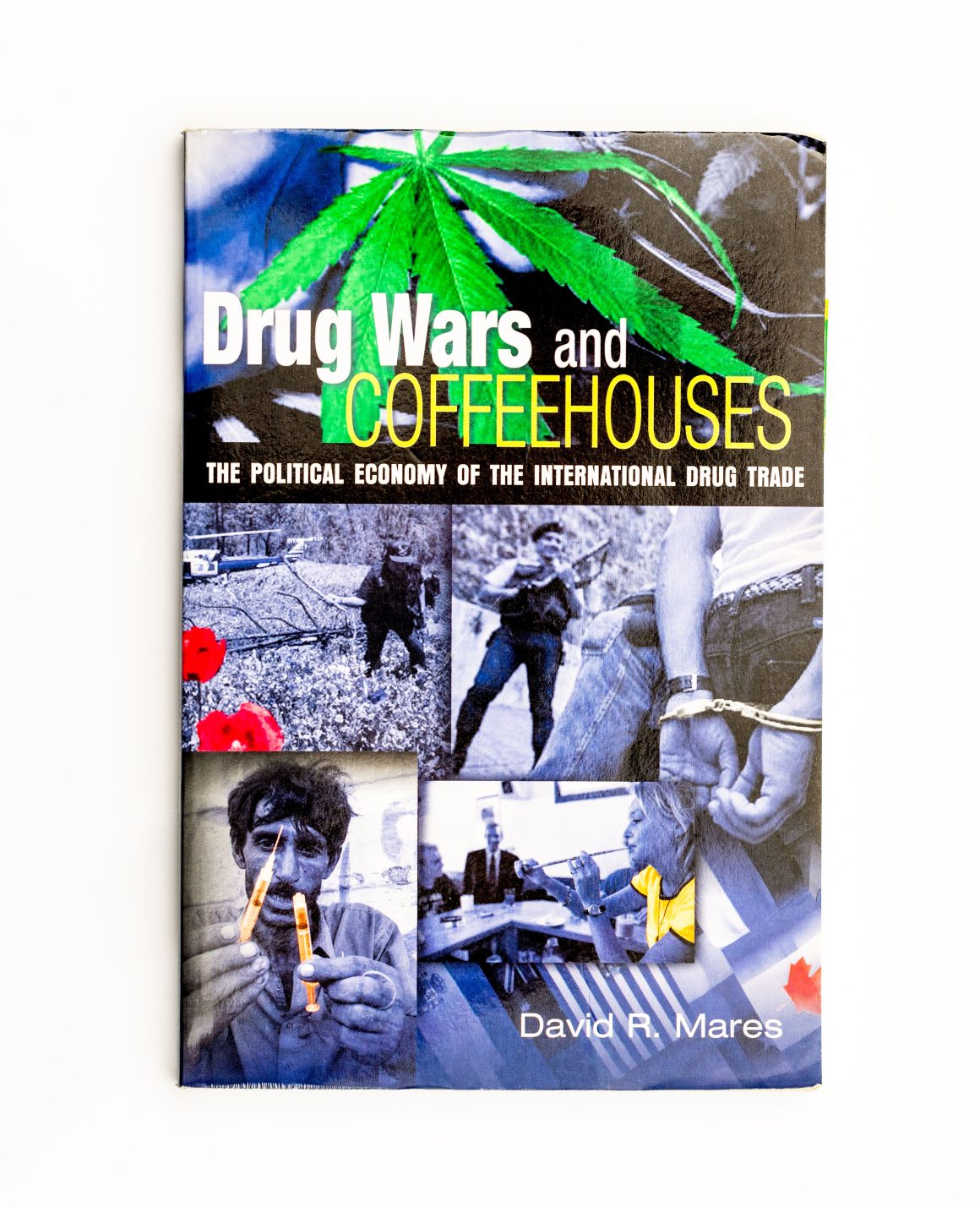 Picture of the front cover of the book Drug Wars and Coffeehouses: The Political Economy of the International Drug by David R. Mares (2006)