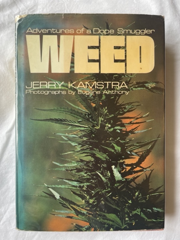 picture of the front cver of a book titled 'Weed: Adventures of a dope smuggler' by Jerry Kamstra