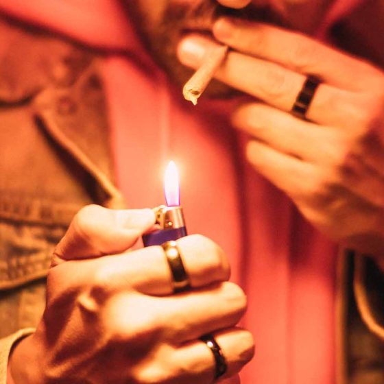 man smoking cannabis